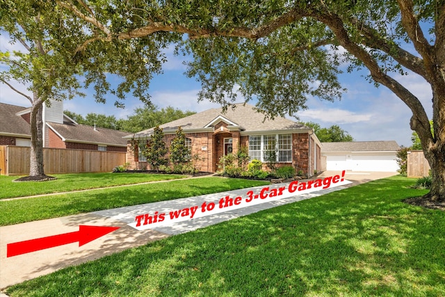 815 Spring Valley Ct, Sugar Land, TX 77479 - view of front of home with brick siding and a garage