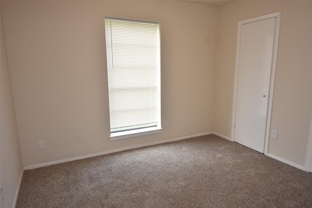 8115 Swan Meadow Ln, Humble, TX 77338 - carpeted empty room featuring baseboards