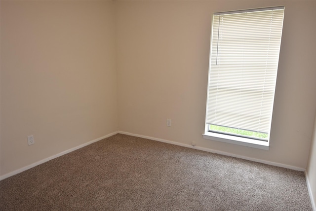 8115 Swan Meadow Ln, Humble, TX 77338 - empty room featuring carpet flooring and baseboards