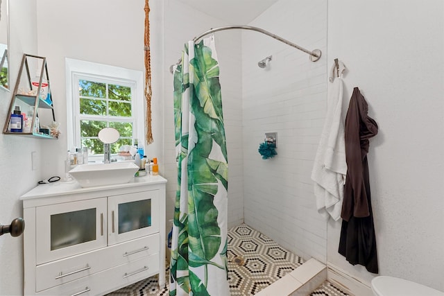2719 Alabama St, Houston, TX 77004 - full bathroom featuring a shower stall, vanity, and toilet