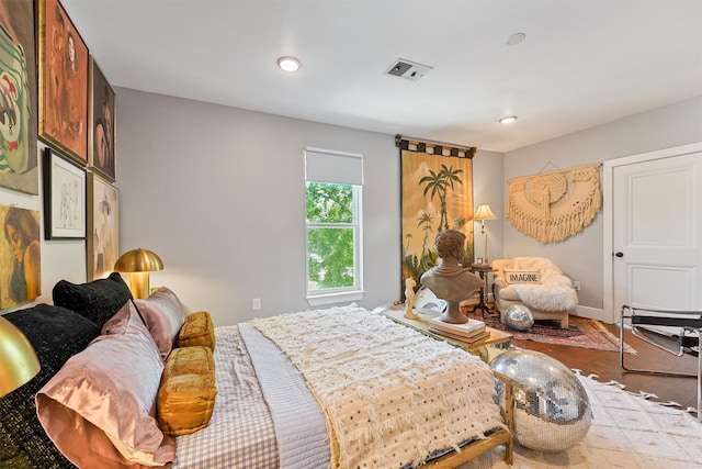 2719 Alabama St, Houston, TX 77004 - bedroom with wood finished floors, recessed lighting, and baseboards