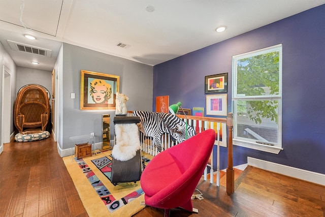 2719 Alabama St, Houston, TX 77004 - playroom with hardwood / wood-style flooring, attic access, baseboards, and recessed lighting
