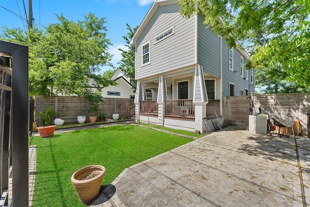 2719 Alabama St, Houston, TX 77004 - rear view of house featuring a porch and a patio area
