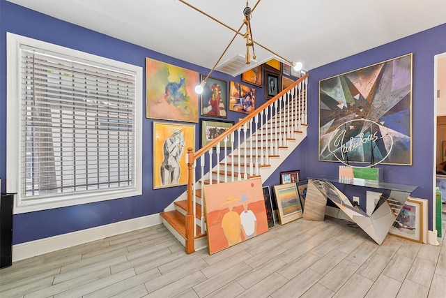 2719 Alabama St, Houston, TX 77004 - stairway with wood finished floors and baseboards