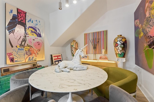 2719 Alabama St, Houston, TX 77004 - dining room featuring wood finished floors and lofted ceiling