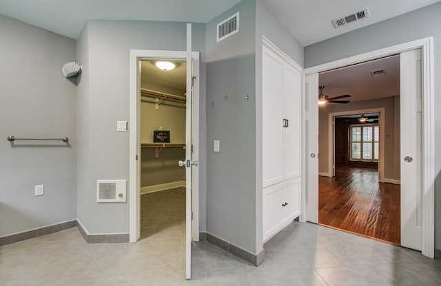 10523 Fawnview Dr, Houston, TX 77070 - corridor with tile patterned flooring and baseboards