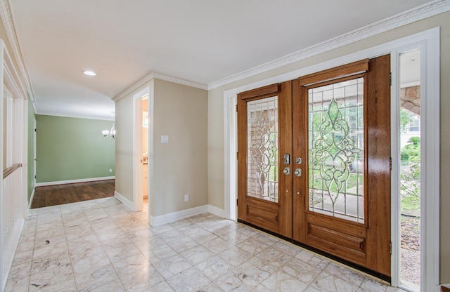 10523 Fawnview Dr, Houston, TX 77070 - entrance foyer featuring french doors, crown molding, baseboards, a chandelier, and recessed lighting