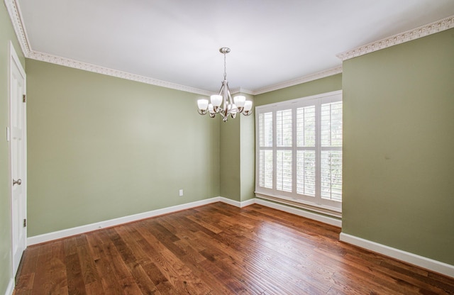 10523 Fawnview Dr, Houston, TX 77070 - empty room featuring a chandelier, wood finished floors, ornamental molding, and baseboards