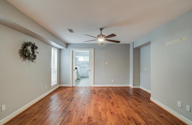 10523 Fawnview Dr, Houston, TX 77070 - spare room featuring ceiling fan, wood finished floors, and baseboards