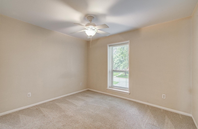 10523 Fawnview Dr, Houston, TX 77070 - spare room featuring light colored carpet, ceiling fan, and baseboards