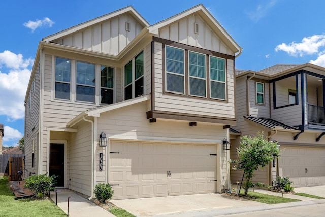 10307 Harmon Smith Dr, Houston, TX 77025 - townhome / multi-family property with a garage, board and batten siding, and concrete driveway