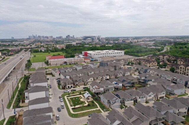 10307 Harmon Smith Dr, Houston, TX 77025 - aerial view of property and surrounding area with nearby urban area