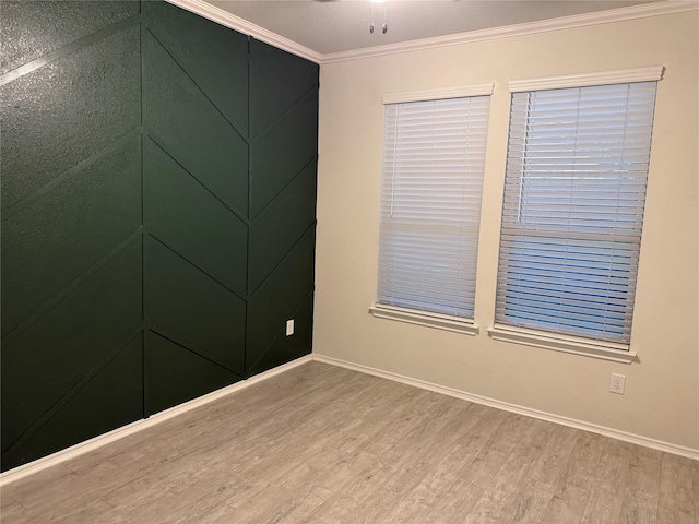 10307 Harmon Smith Dr, Houston, TX 77025 - unfurnished room with light wood-style floors, ornamental molding, and ceiling fan
