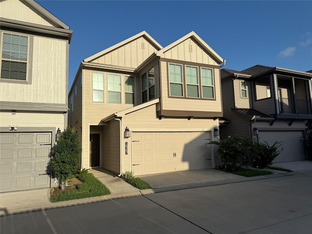 10307 Harmon Smith Dr, Houston, TX 77025 - multi unit property featuring a garage, driveway, and board and batten siding