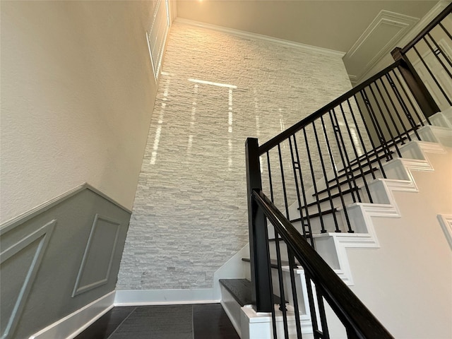 10307 Harmon Smith Dr, Houston, TX 77025 - stairs featuring crown molding and wainscoting