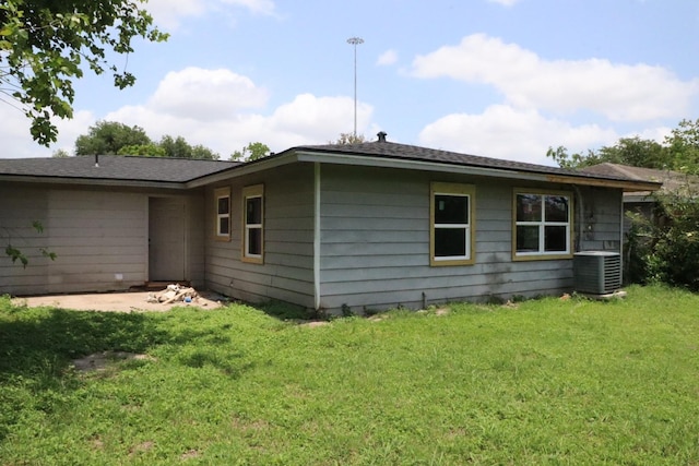 3816 Kaplan Dr, Pasadena, TX 77503 - view of side of property featuring central AC and a yard