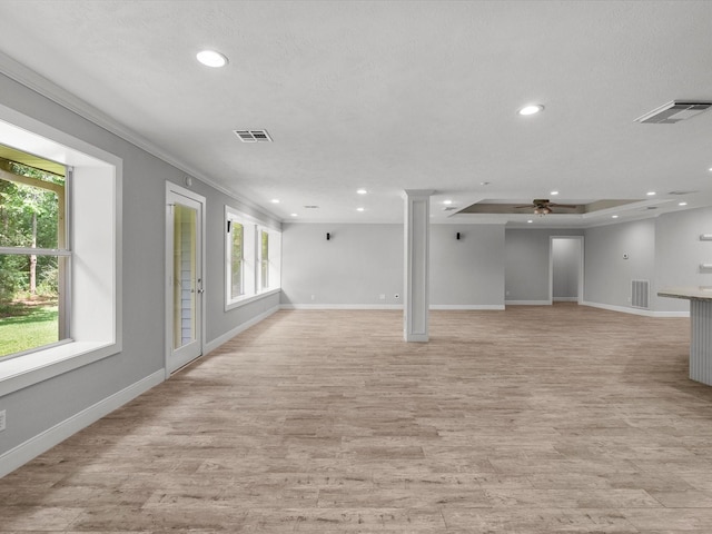 5401 Palm Dr, Dickinson, TX 77539 - unfurnished living room featuring healthy amount of natural light, recessed lighting, baseboards, a ceiling fan, and crown molding
