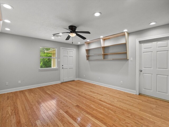 5401 Palm Dr, Dickinson, TX 77539 - spare room featuring baseboards, a ceiling fan, light wood finished floors, and recessed lighting