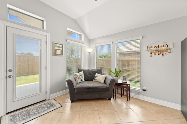 31815 Forest Oak Ln, Conroe, TX 77385 - sitting room featuring vaulted ceiling, baseboards, and light tile patterned floors