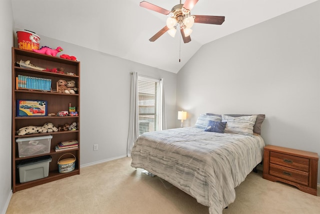 31815 Forest Oak Ln, Conroe, TX 77385 - bedroom featuring light colored carpet, vaulted ceiling, ceiling fan, and baseboards