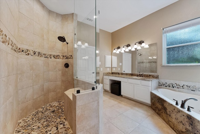 14102 Pollux Ct, Tomball, TX 77375 - bathroom featuring walk in shower, a bath, vanity, and tile patterned flooring