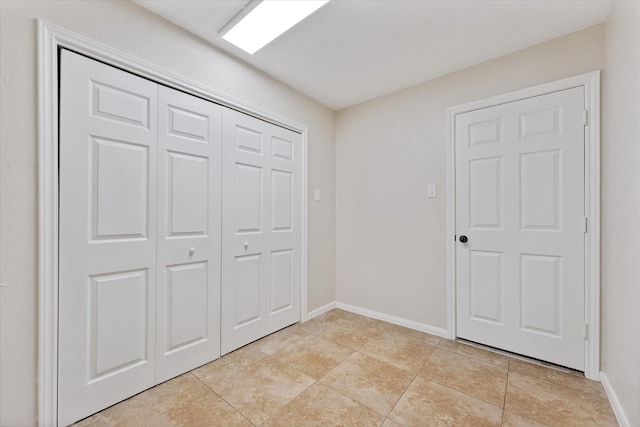 14102 Pollux Ct, Tomball, TX 77375 - unfurnished bedroom with a closet and baseboards