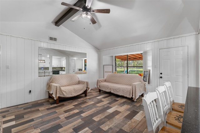 14232 Calhoun Rd, Conroe, TX 77302 - living room with wood finished floors, ceiling fan, and wooden walls