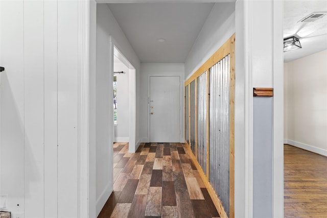 14232 Calhoun Rd, Conroe, TX 77302 - hall featuring dark wood-style flooring and baseboards