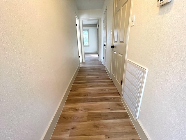 1922 14th Ave N, Texas City, TX 77590 - hall featuring wood finished floors and baseboards