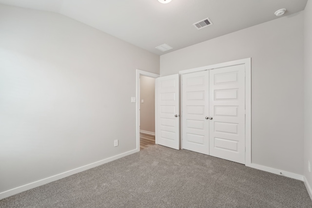 18733 Bliss Pl, New Caney, TX 77357 - unfurnished bedroom with carpet floors, a closet, and baseboards