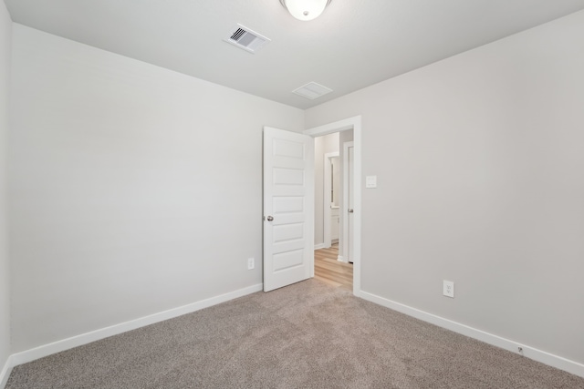 18733 Bliss Pl, New Caney, TX 77357 - spare room with carpet and baseboards
