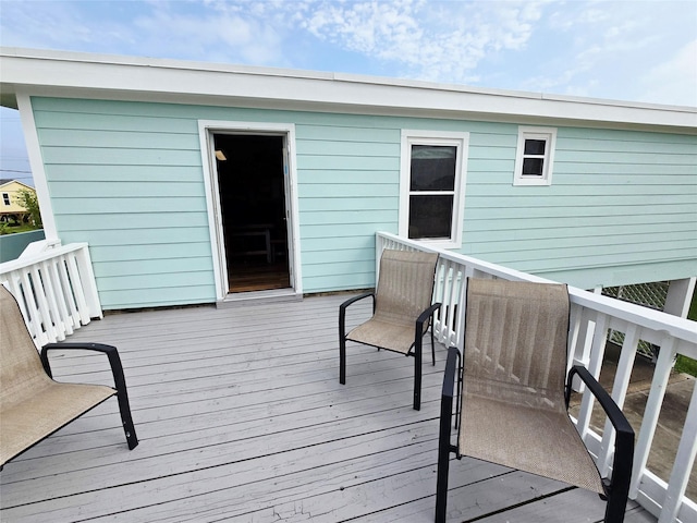 16611 Jolly Roger Rd, Jamaica Beach, TX 77554 - view of wooden deck