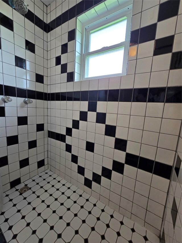 16611 Jolly Roger Rd, Jamaica Beach, TX 77554 - bathroom with tiled shower