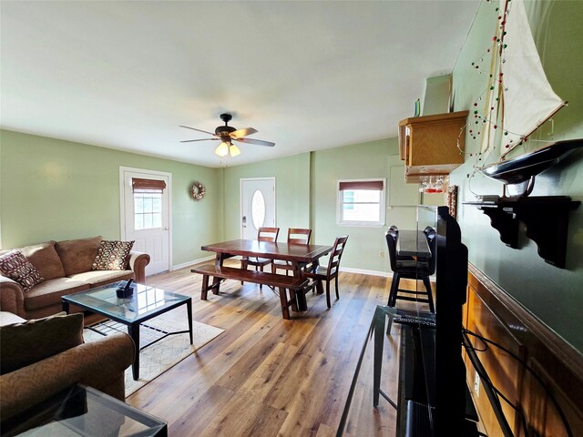 16611 Jolly Roger Rd, Jamaica Beach, TX 77554 - living area featuring ceiling fan, light wood-type flooring, and baseboards
