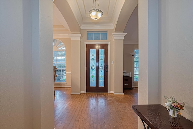 2403 Crescent Hollow Ct, Spring, TX 77388 - entryway with ornamental molding, hardwood / wood-style flooring, arched walkways, baseboards, and a textured wall