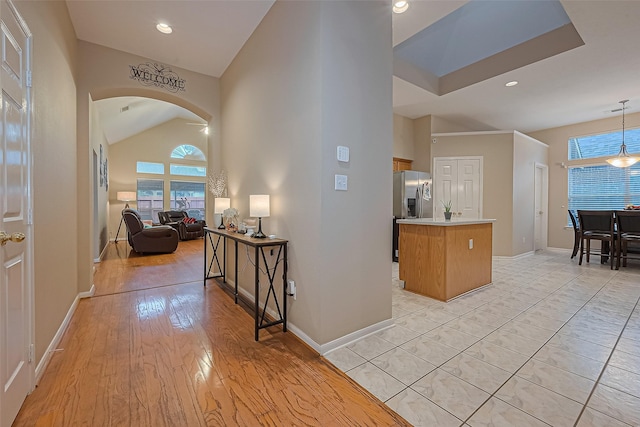 2403 Crescent Hollow Ct, Spring, TX 77388 - hallway featuring arched walkways, recessed lighting, light wood-style flooring, baseboards, and vaulted ceiling
