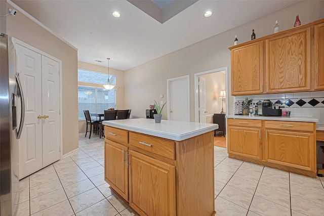 2403 Crescent Hollow Ct, Spring, TX 77388 - kitchen with backsplash, stainless steel refrigerator with ice dispenser, light countertops, a center island, and recessed lighting