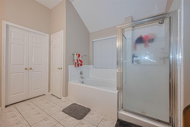 2403 Crescent Hollow Ct, Spring, TX 77388 - bathroom with a bath, a shower stall, marble look tile flooring, and lofted ceiling