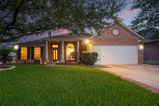 2403 Crescent Hollow Ct, Spring, TX 77388 - view of front of home featuring concrete driveway, an attached garage, a front yard, and brick siding