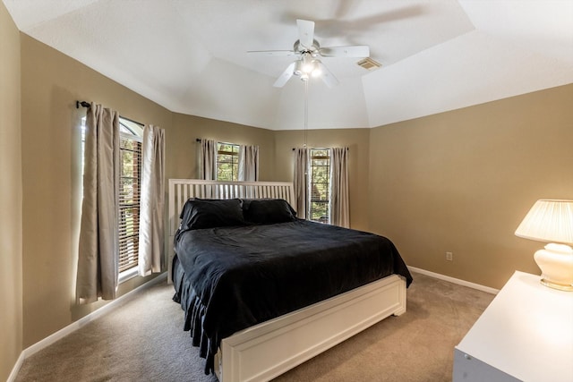 17718 Dove Tree Ln, Spring, TX 77379 - bedroom with light colored carpet, lofted ceiling, baseboards, and ceiling fan