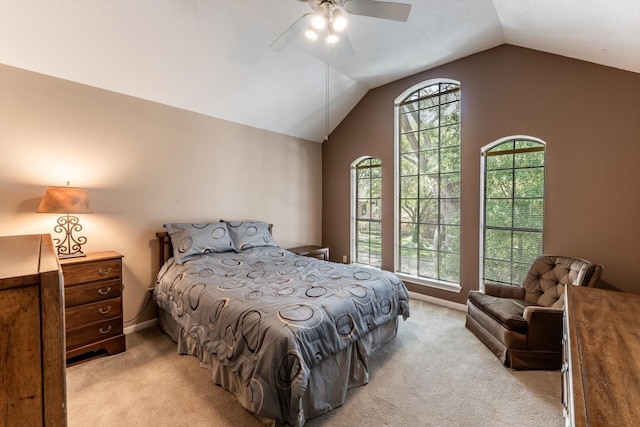 17718 Dove Tree Ln, Spring, TX 77379 - bedroom with light carpet, lofted ceiling, ceiling fan, and baseboards