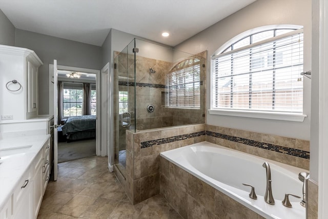 17718 Dove Tree Ln, Spring, TX 77379 - full bath featuring ensuite bathroom, a stall shower, a garden tub, vanity, and recessed lighting