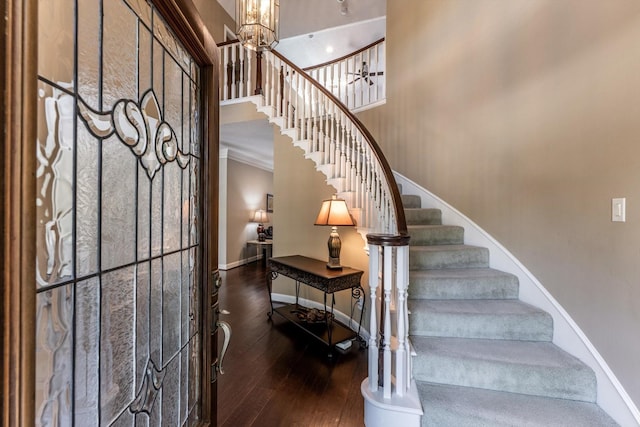 17718 Dove Tree Ln, Spring, TX 77379 - foyer entrance featuring stairway, hardwood / wood-style flooring, baseboards, and crown molding