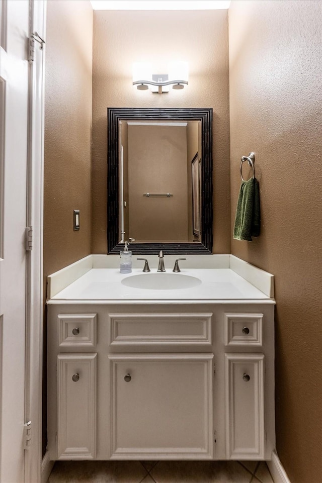 17718 Dove Tree Ln, Spring, TX 77379 - bathroom with vanity and tile patterned flooring