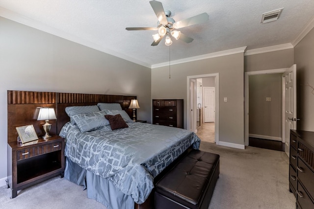 17718 Dove Tree Ln, Spring, TX 77379 - bedroom with light carpet, crown molding, baseboards, a textured ceiling, and a ceiling fan