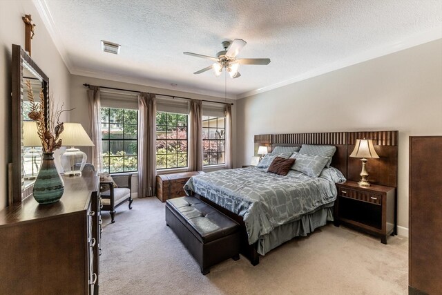 17718 Dove Tree Ln, Spring, TX 77379 - bedroom featuring light colored carpet, crown molding, a textured ceiling, ceiling fan, and baseboards