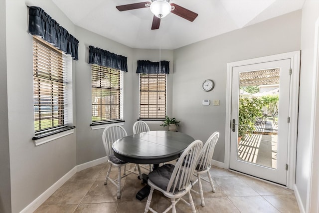 17718 Dove Tree Ln, Spring, TX 77379 - dining room with a ceiling fan, baseboards, and light tile patterned flooring