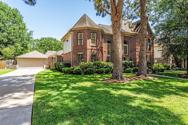 17718 Dove Tree Ln, Spring, TX 77379 - view of front of house with brick siding and a detached garage