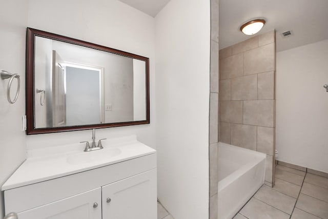7836 Bateman Ln Unit 7836, Houston, TX 77088 - bathroom with tile patterned floors and vanity