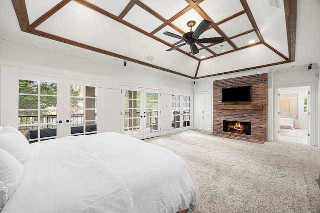 5567 Longmont Dr, Houston, TX 77056 - carpeted bedroom featuring french doors, access to exterior, a brick fireplace, recessed lighting, and ensuite bathroom